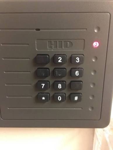 Worn keypad buttons with legends rubbed off